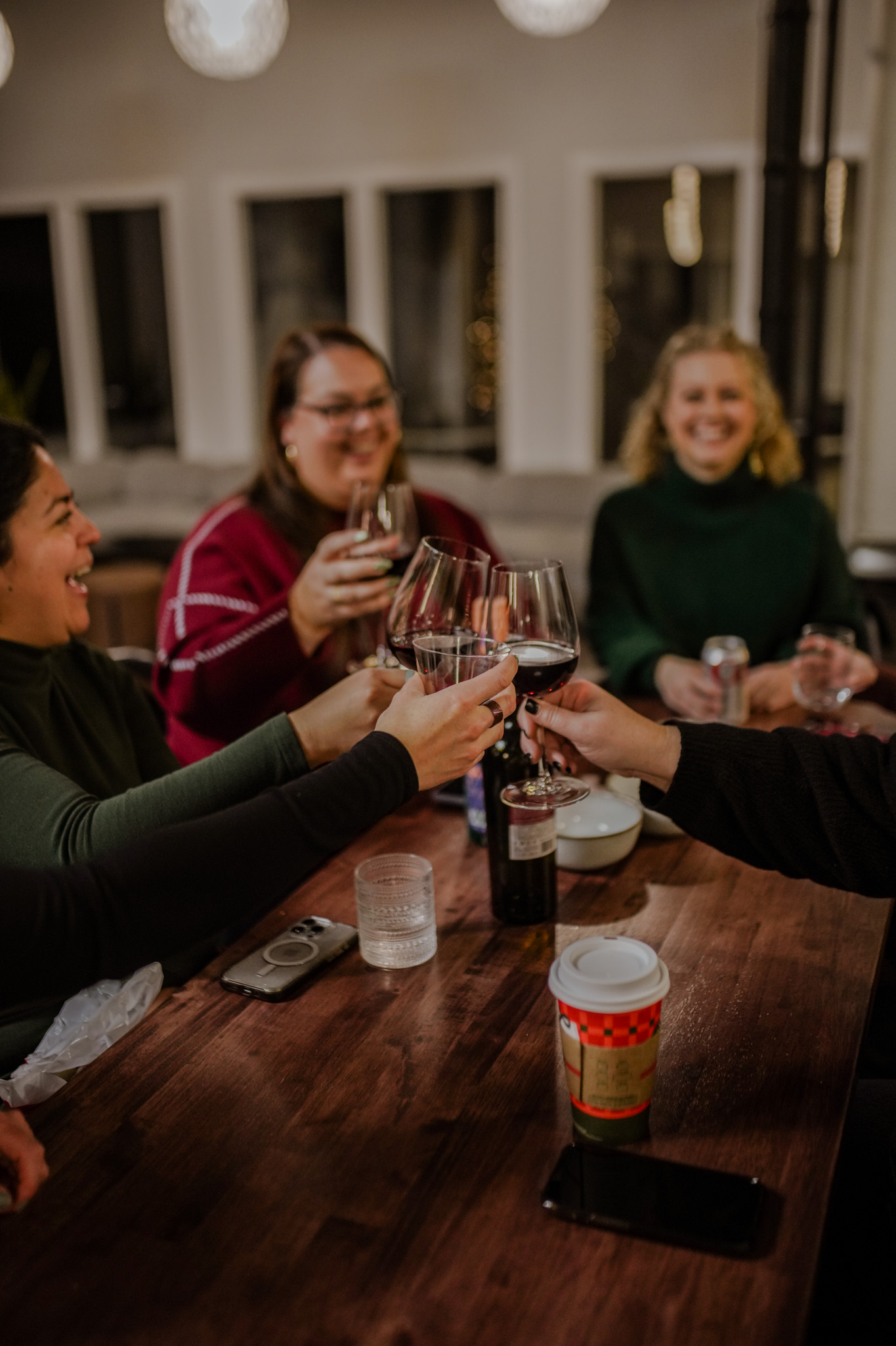 Members raising glasses at a dinner