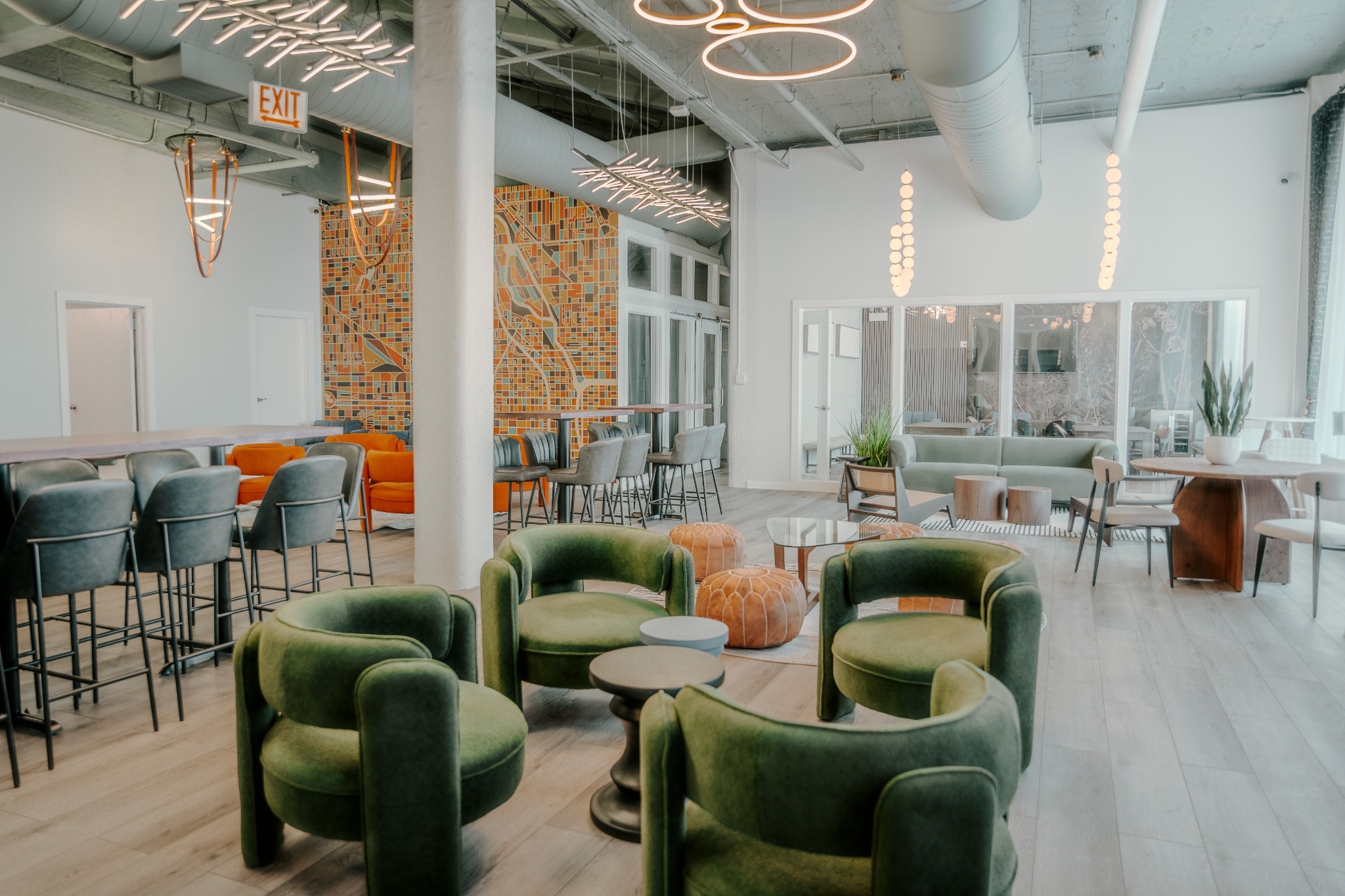 Inside the River North clubhouse, with the lounge and Chicago map mural