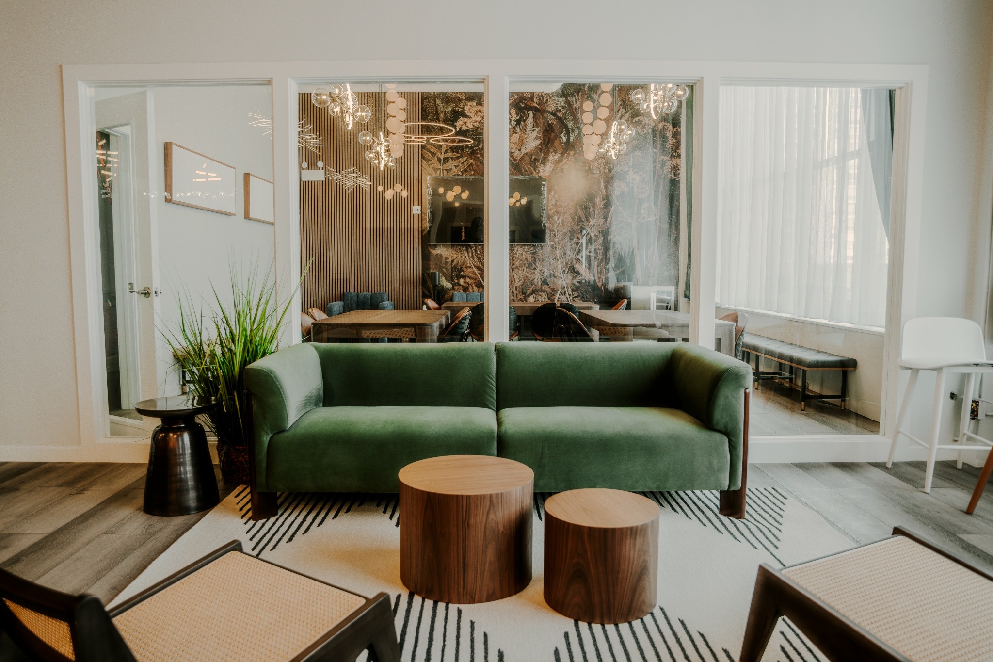 A green velvet sofa lounge at the River North clubhouse in Chicago