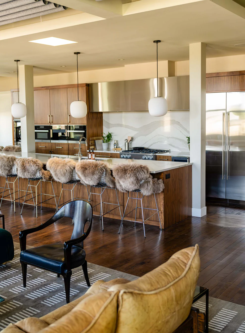 The kitchen island and bar seating at Firehouse Lounge